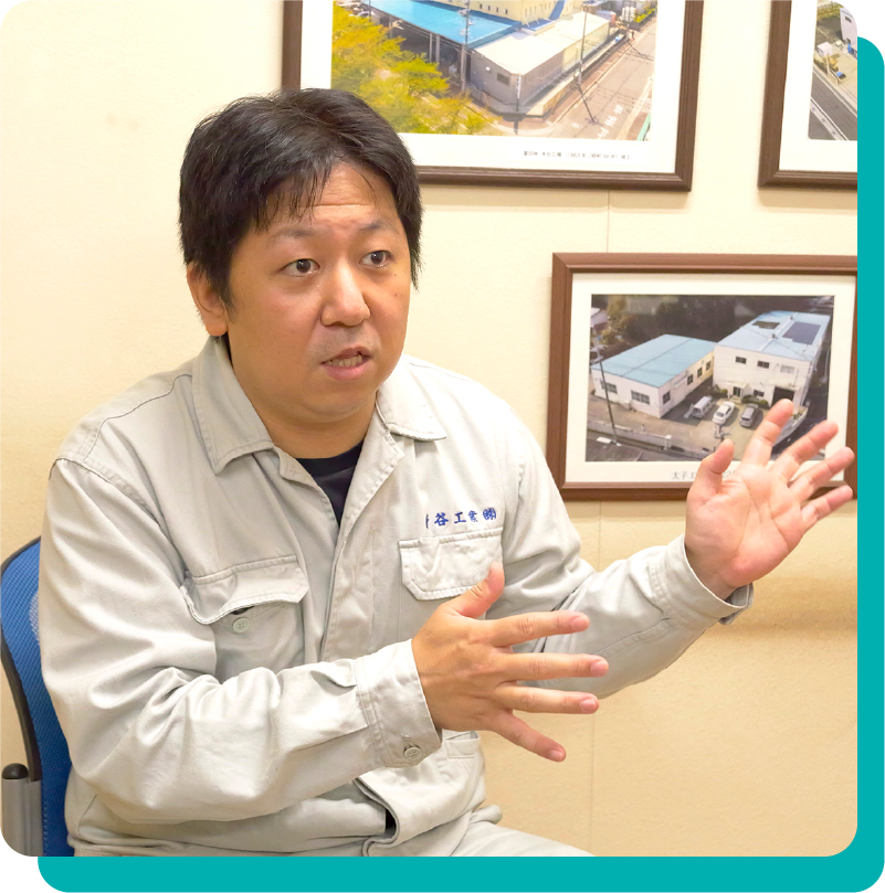 インタビューに答えるS氏